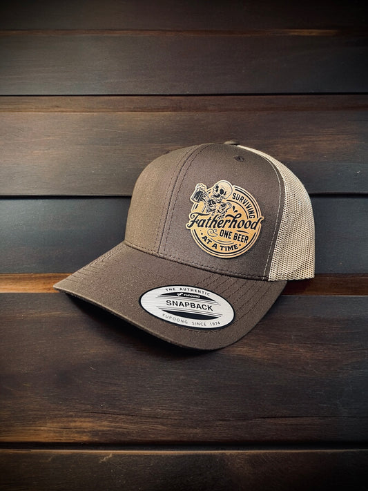 Surviving Fatherhood One Beer at a Time Trucker Hat